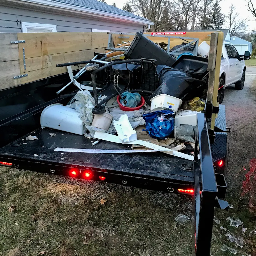 Roll-off dumpster delivered to a residential driveway in Finley
