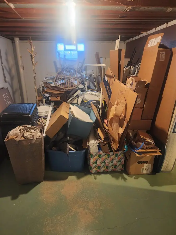 Roll-off dumpster container at job site for Cleanout Dumpster Rental in Finley